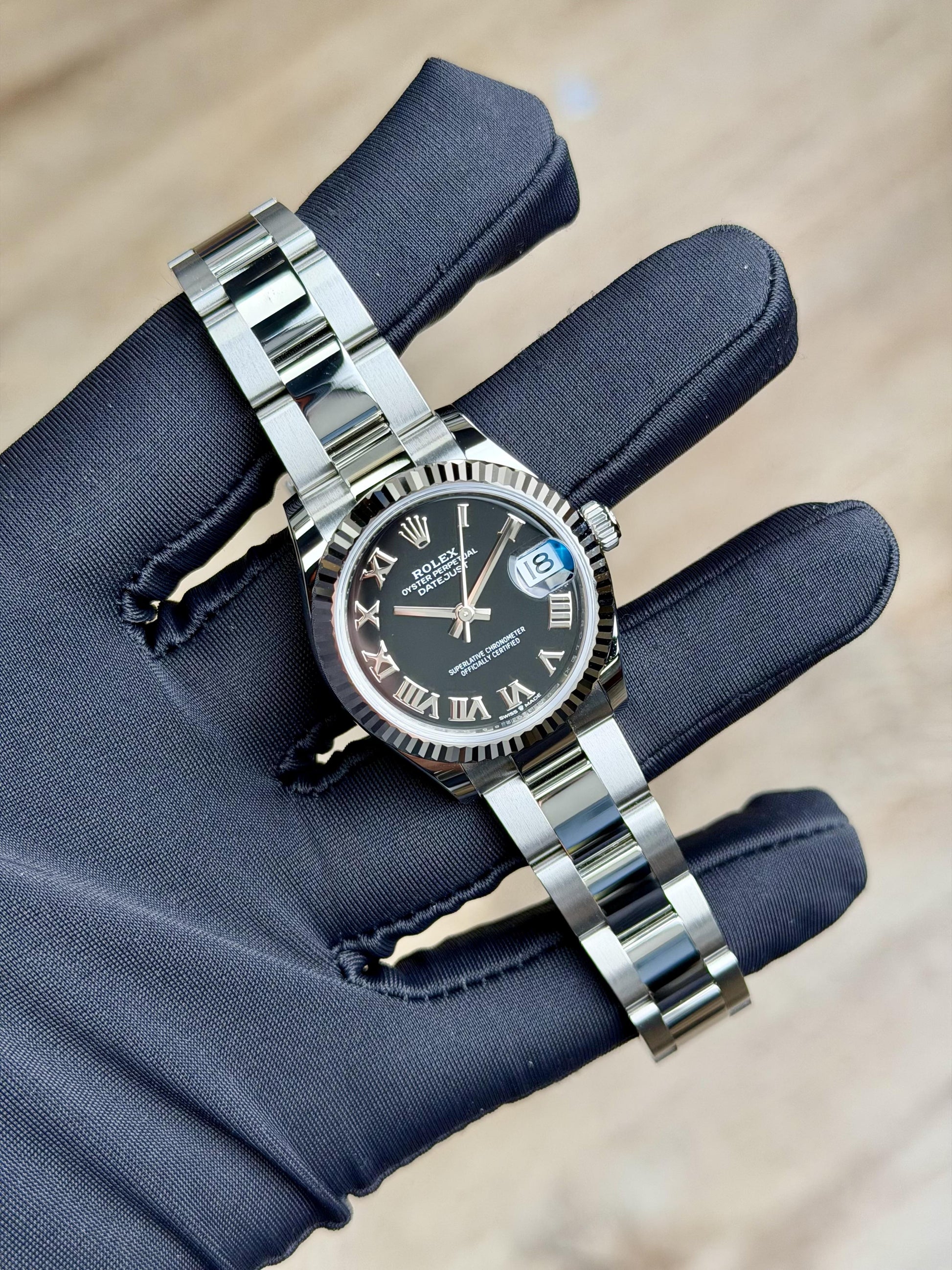 Rolex Datejust 31 Black Roman Fluted Oyster 2026 Unworn 278274