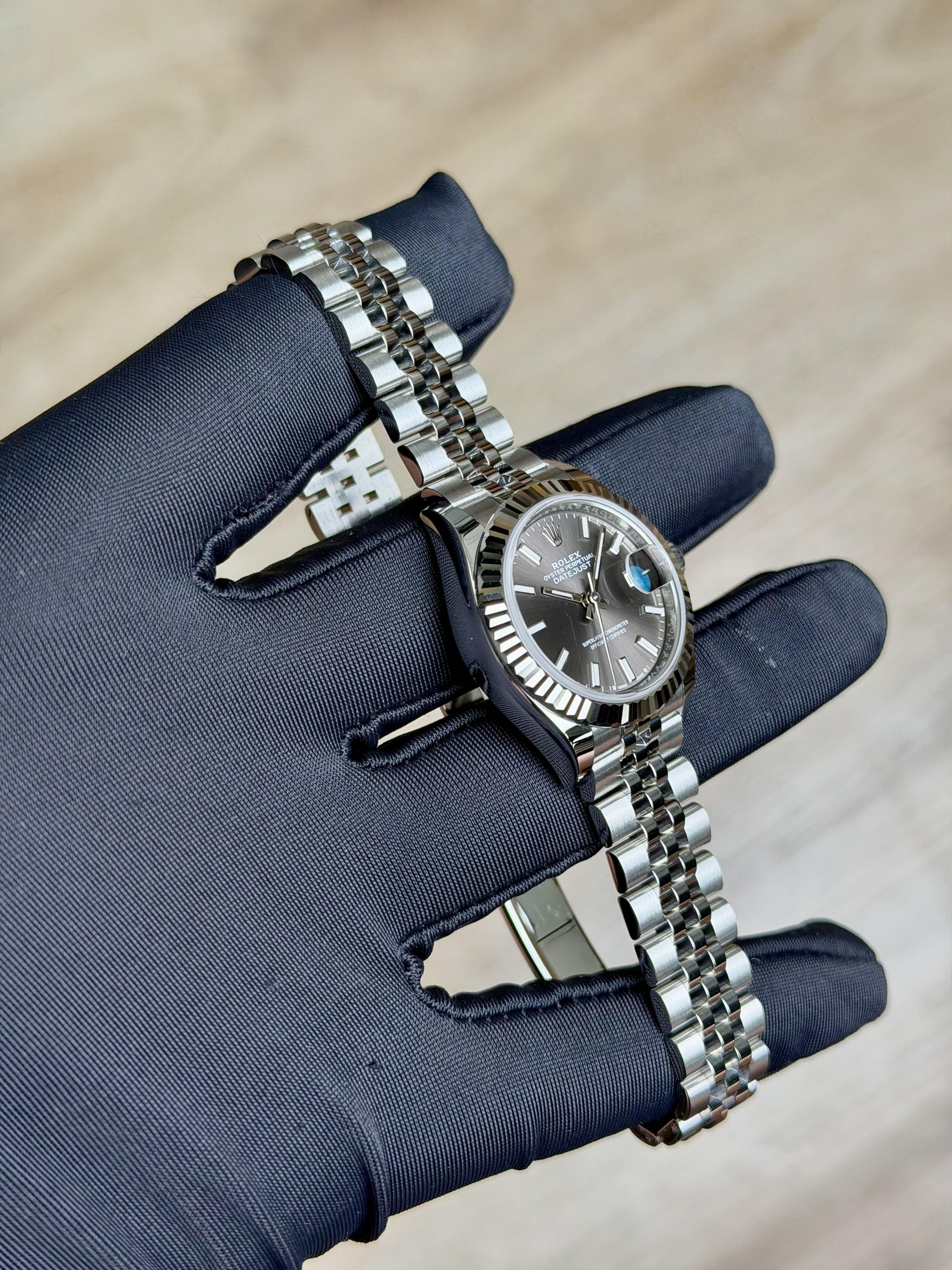 Rolex Datejust 28 Dark Grey Index Fluted Jubilee 2026 Unworn 279174