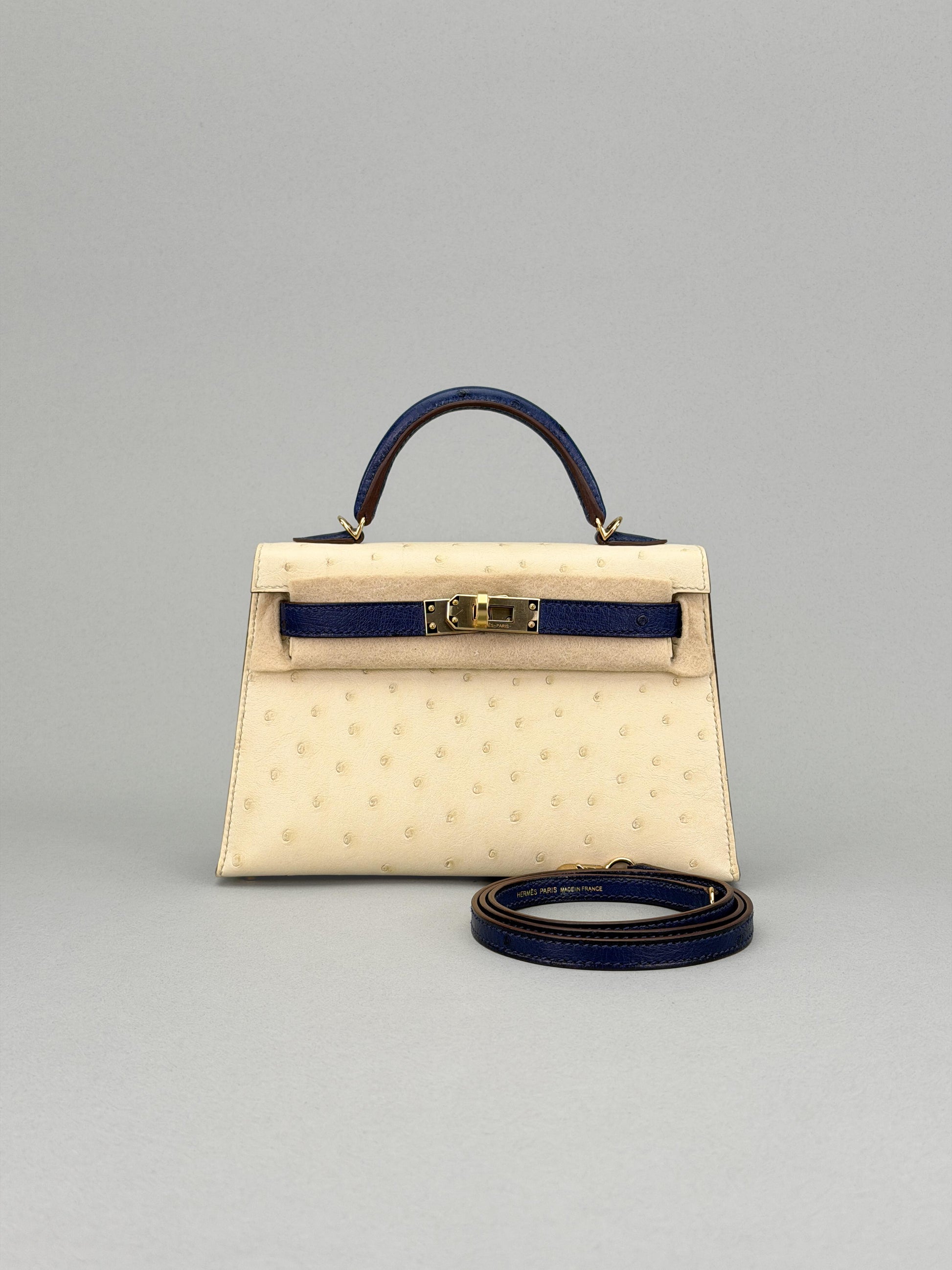 Hermes Mini Kelly 20 Ostrich HSS Beton/Blue Iris Champagne Hardware U Stamp 2023