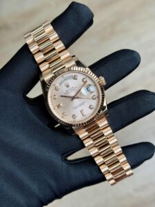 Rolex Day-Date 36 Rose Sundust Diamond Fluted President Preowned W&B 118235